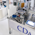 rotuladora automática para aplicação de 2 rótulos nas faces de produtos CDA