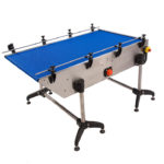 Loading / unloading table by automatic modular belt